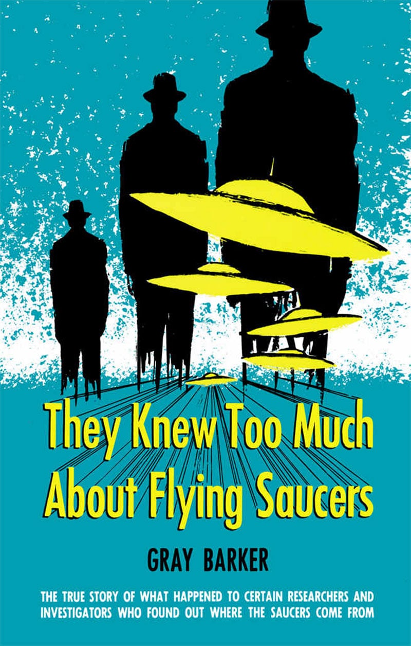 The 1956 cover of They Knew Too Much About Flying Saucers: three black silhouettes in hats loom over yellow flying saucers against a turquoise sky.