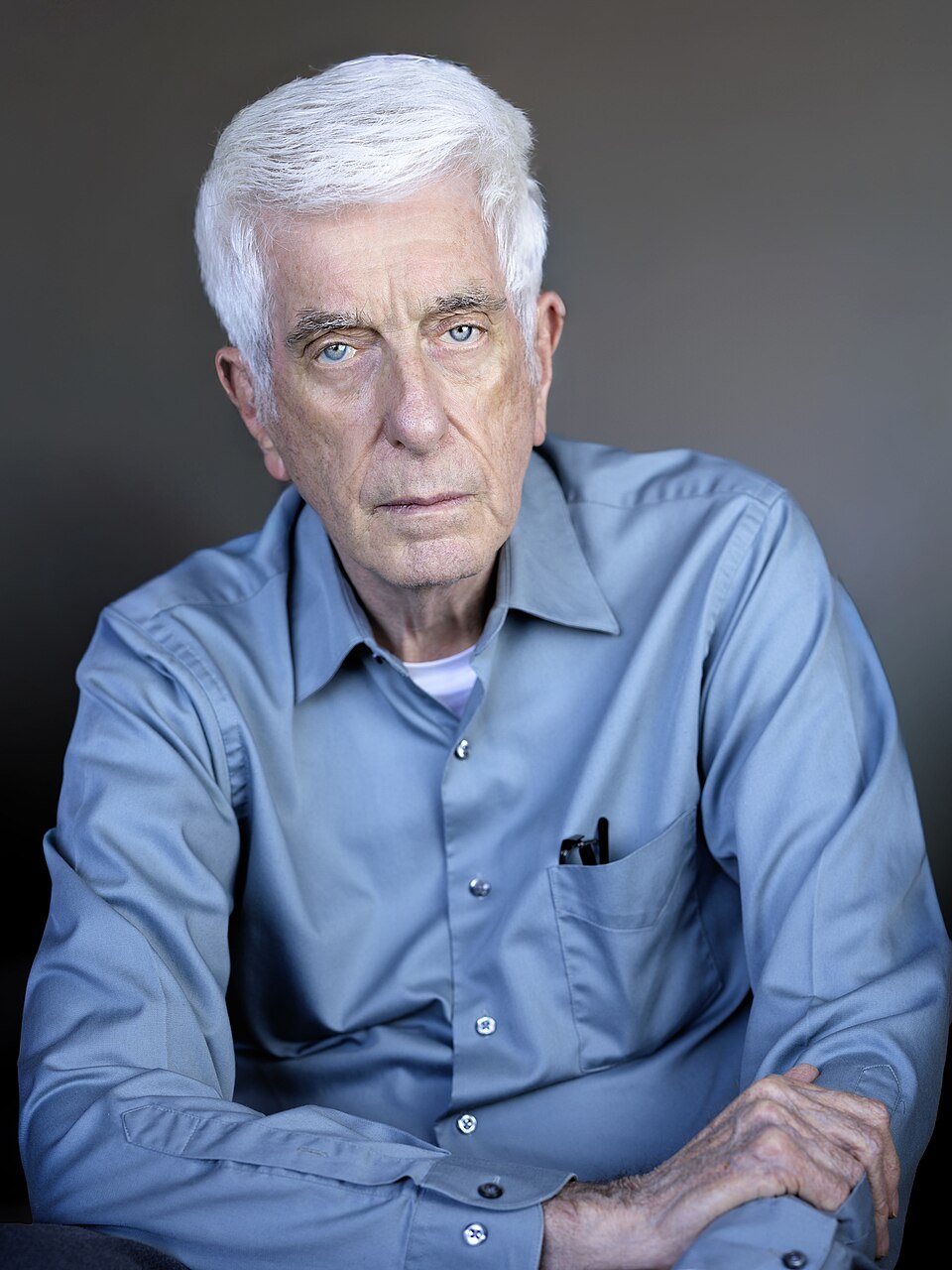 Jacques Vallée seated at his home in 2024.