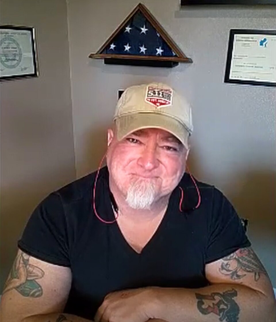 Luis Elizondo wearing a cap during an interview with Max Moszkowicz.